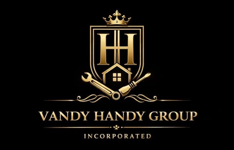 Vandy Handy Group gold logo with shield, crown, and house symbol on black background